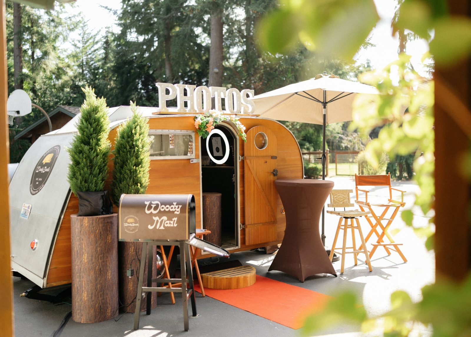 The Woody Booth trailer in the sunshine with the Woody Mail box